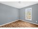 Bedroom with hardwood floors and one window at 108 Mickey Cir, Durham, NC 27712