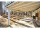 Covered patio with concrete flooring and wooded backyard at 108 Mickey Cir, Durham, NC 27712