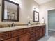 Double vanity bathroom with granite countertops at 116 Telluride Trl, Garner, NC 27529