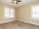 Spacious bedroom with neutral-toned walls and carpet flooring at 116 Telluride Trl, Garner, NC 27529