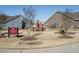 Community garden with central seating area, raised garden beds and shed at 116 Telluride Trl, Garner, NC 27529