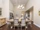 Formal dining room with hardwood floors and a chandelier at 116 Telluride Trl, Garner, NC 27529