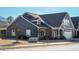 Two-story house with gray siding, white trim, and landscaping at 116 Telluride Trl, Garner, NC 27529