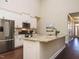 Modern kitchen with stainless steel appliances and granite countertops at 116 Telluride Trl, Garner, NC 27529
