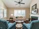 Living room boasts a fireplace and plenty of natural light at 116 Telluride Trl, Garner, NC 27529