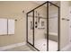 Large walk-in shower with glass enclosure and seat at 116 Telluride Trl, Garner, NC 27529