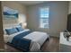 Bedroom with a queen-size bed, neutral decor, and large window at 1315 Richfield Oaks Dr, Homesite 3, Fuquay Varina, NC 27526