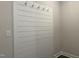 White-paneled coat closet with multiple hooks at 1315 Richfield Oaks Dr, Homesite 3, Fuquay Varina, NC 27526