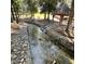 Small creek with stone retaining walls at 1315 Richfield Oaks Dr, Homesite 3, Fuquay Varina, NC 27526