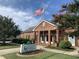 Brick building with American flag and landscaping at 1315 Richfield Oaks Dr, Homesite 3, Fuquay Varina, NC 27526