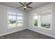 Bright, neutral bedroom featuring plush carpet and large windows offering exterior views at 134 Oban Dr, Homesite 133, Sanford, NC 27330