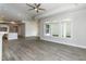 Spacious open-concept living area with a kitchen, dining space, and large windows for natural light at 134 Oban Dr, Homesite 133, Sanford, NC 27330