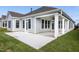 View of a covered patio and freshly installed sod at the rear of a new construction home at 134 Oban Dr, Homesite 133, Sanford, NC 27330