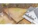 House with a large backyard, shed, and privacy fence at 1513 Hoke Landing Ln, Raleigh, NC 27603