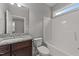 Clean bathroom with granite vanity and bathtub at 1513 Hoke Landing Ln, Raleigh, NC 27603