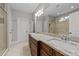 Double vanity bathroom with granite countertop at 1513 Hoke Landing Ln, Raleigh, NC 27603