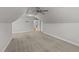Second bedroom with sloped ceilings and access to hallway at 1513 Hoke Landing Ln, Raleigh, NC 27603