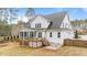 Two-story house with gray siding, deck and screened porch at 1513 Hoke Landing Ln, Raleigh, NC 27603