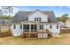 Two-story house with gray siding, deck and screened porch at 1513 Hoke Landing Ln, Raleigh, NC 27603