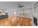 Kitchen with hardwood floors, island, and fireplace at 1513 Hoke Landing Ln, Raleigh, NC 27603