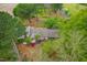 Aerial view of a home with lush landscaping and mature trees offering privacy and curb appeal at 1741 W Blackman Rd, Dunn, NC 28334