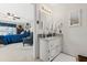 Well-lit bathroom with a white vanity, marble countertop, and decorative accents at 1741 W Blackman Rd, Dunn, NC 28334