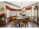 Cozy dining room with large bay window, and tile flooring at 1741 W Blackman Rd, Dunn, NC 28334