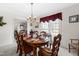 Elegant dining room with traditional furnishings, ample seating, and abundant natural light at 1741 W Blackman Rd, Dunn, NC 28334