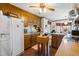 Charming kitchen features wood cabinets, tile flooring, and stainless steel appliances at 1741 W Blackman Rd, Dunn, NC 28334