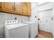 Functional laundry room featuring a washer and dryer at 1741 W Blackman Rd, Dunn, NC 28334