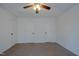 Bedroom with three closets and ceiling fan at 2 Woodsage Ln, Durham, NC 27713