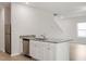Modern kitchen with island, granite countertops, and stainless steel appliances at 207 Shelfit Trl, Oxford, NC 27565