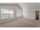 Spacious main bedroom with neutral carpet and large windows at 207 Shelfit Trl, Oxford, NC 27565
