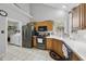 Kitchen with stainless steel appliances and wood cabinets at 208 Trailview Dr, Cary, NC 27513