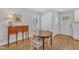 Small dining area with round table and wooden chairs at 2223 Shannon St, Raleigh, NC 27610