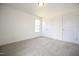 Bedroom with a window, closet, and door at 223 Johnson Ridge Way, Four Oaks, NC 27524
