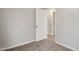 Well-lit bedroom with neutral walls and carpet at 2328 Radiance Dr, Burlington, NC 27215