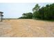 This home boasts a large backyard filled with straw over the soil at 247 Johnson Ridge Way, Four Oaks, NC 27524