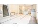 Kitchen featuring an island and white cabinetry at 247 Johnson Ridge Way, Four Oaks, NC 27524