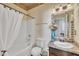 Clean bathroom with vanity and bathtub shower combo at 309 Coalyard Dr, Garner, NC 27529
