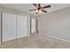 Simple bedroom with large closet and ceiling fan at 309 Coalyard Dr, Garner, NC 27529