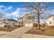 Two-story house with a neutral color scheme and a two-car garage at 309 Coalyard Dr, Garner, NC 27529