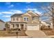 Two-story house with a neutral color scheme and a two-car garage at 309 Coalyard Dr, Garner, NC 27529