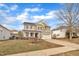 Two-story house with attached garage and manicured lawn at 309 Coalyard Dr, Garner, NC 27529