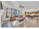 Open living space with kitchen view and hardwood floors at 309 Coalyard Dr, Garner, NC 27529