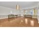 Spacious living room with hardwood floors and neutral walls at 309 Coalyard Dr, Garner, NC 27529