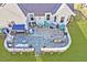 Aerial view of an outdoor patio area perfect for relaxing and entertaining guests at 347 Country Mill Way, Fuquay Varina, NC 27526
