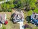 Beautiful aerial view of the house, showing the roof, backyard, and landscaping at 347 Country Mill Way, Fuquay Varina, NC 27526