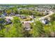 Aerial view of neighborhood with beautiful landscaping and green lawns at 347 Country Mill Way, Fuquay Varina, NC 27526