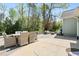 Outdoor patio featuring stylish seating arrangements surrounded by lush greenery at 347 Country Mill Way, Fuquay Varina, NC 27526